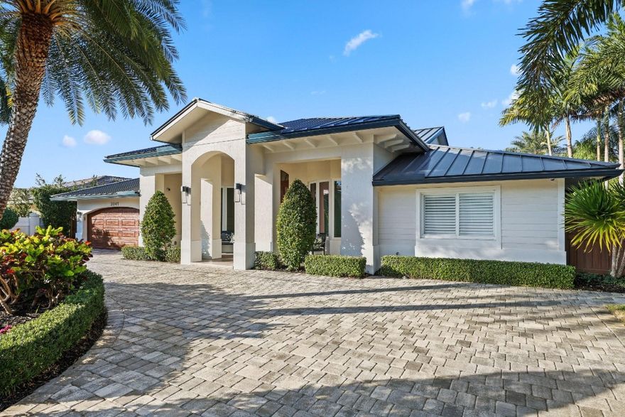 Premier,waterfront Coral Ridge Country Club home,expanded,fully remodeled and completed in 2018. 90' concrete dock,boat lift-15,000 lbs. Ocean access,no fixed bridges. Covered pergola with dining area,outdoor kitchen on covered patio. 5 bedrooms,3 full bath. Thermador appliances,gas range. Custom closets ,include a cedar lined one. Vaulted,wood ceilings in main area and patio,ship lap in the entry and family room, and coffered ceilings. 2 acs 2024/2025,impact glass/doors for the entire home,tankless hot water heater 2017,metal roof 2017,pool 2018. 2 car garage,epoxy floor,Garagetek,EV charger. 150-bottle wine cooler in bar. Walk to parks,restaurants,golf,beach-offering the Florida lifestyle at your doorstep. Bring your boat and move right in, with fishing, paddle boarding in your backyard.