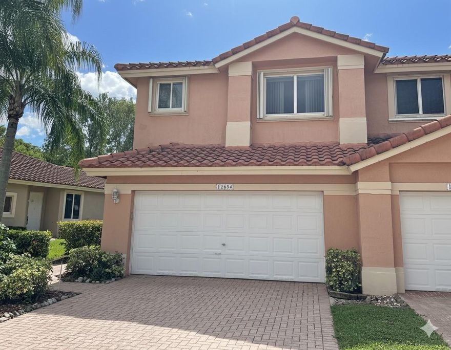 Beautiful & spacious corner-unit waterfront Townhouse in the Fairways at Heron Bay. Country Club Style Living w/ access to ALL Heron Bay Amenities!  3 bedrooms, 2.5 bathrooms & 2 car garage! Amazing lake views from this townhome & screened porch. Large primary bedroom with walk in closets. Primary bath has separate tub and shower.  Corner lot with extra space between units & brick pavers patio and driveway.  Gated community with 3 resort style pools, clubhouses, exercise facilities, kids splash park, playground, clay tennis courts, basketball courts and more. Great schools and convenient to shopping, restaurants & Publix. Plenty of guest parking.