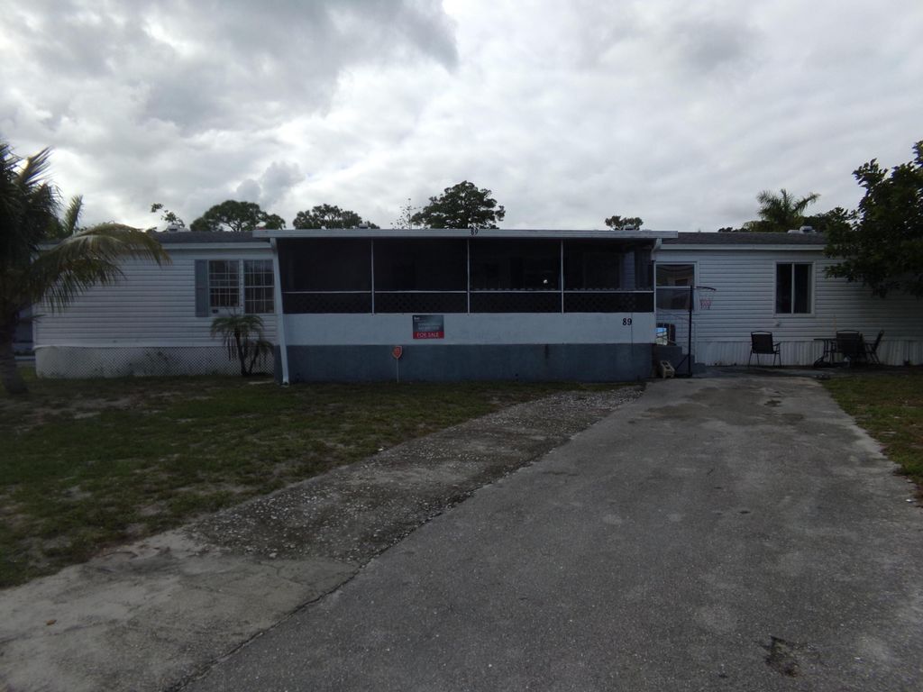 Photo of 89 S Stuart Circle, Greenacres, FL 33463 (MLS # B26017736)