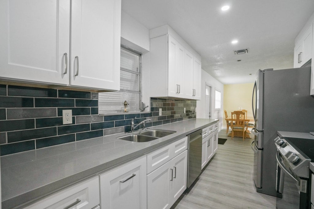 Photo of 2270 SW 30TH Terrace, Fort Lauderdale, FL 33312 (MLS # B26053786)