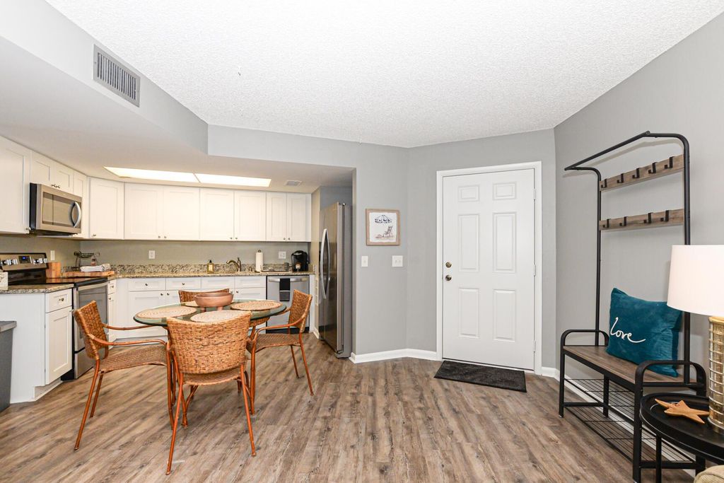 Photo of 2055 NE Collins Circle #6-30, Jensen Beach, FL 34957 (MLS # R11124727)