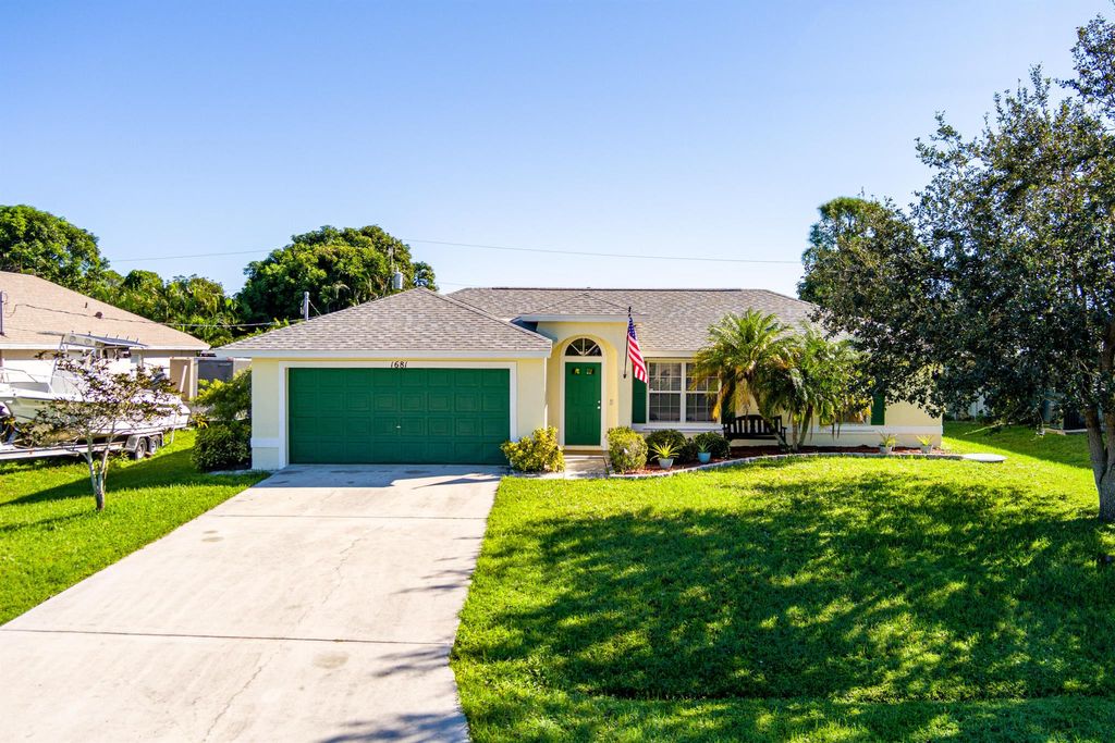 Photo of 1681 SW Buffum Lane, Port Saint Lucie, FL 34984 (MLS # R11132370)