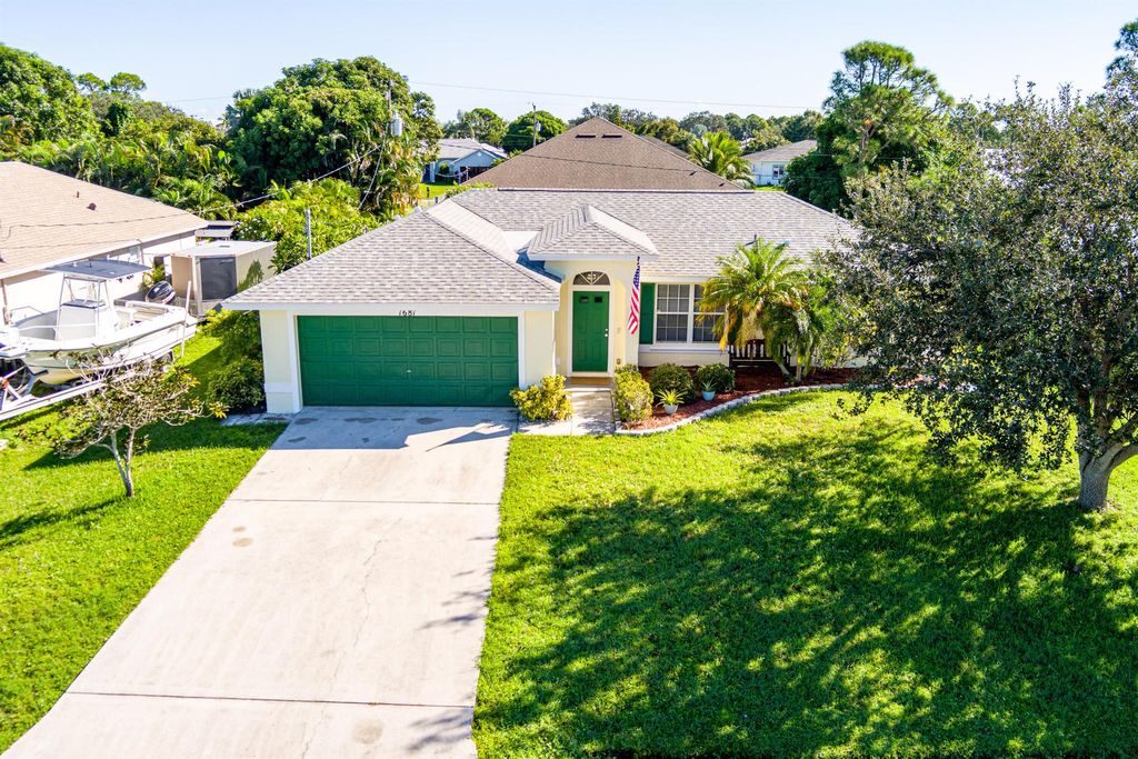 Photo of 1681 SW Buffum Lane, Port Saint Lucie, FL 34984 (MLS # R11132370)