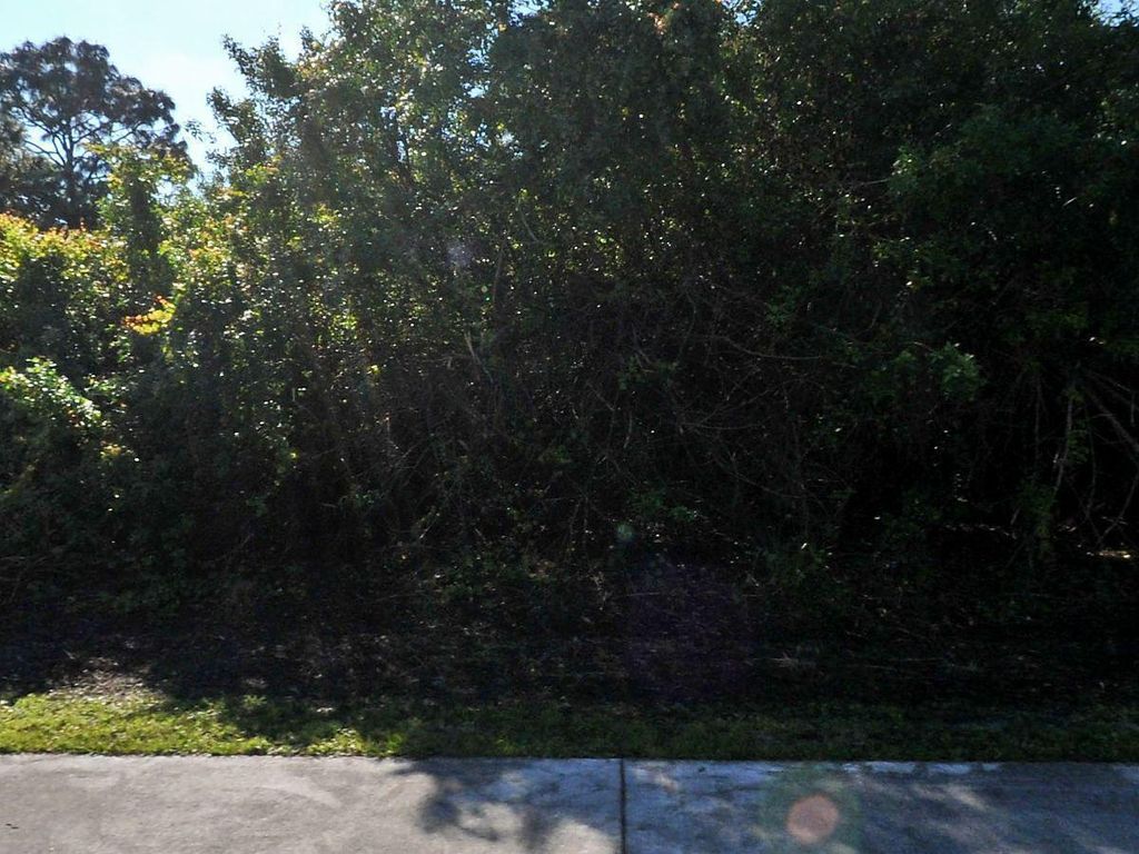 Photo of 326 SW Becker Road, Port Saint Lucie, FL 34953 (MLS # B26021619)