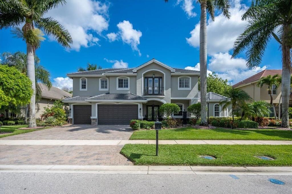 Photo of 10694 Versailles Boulevard, Wellington, FL 33449 (MLS # R10793168)