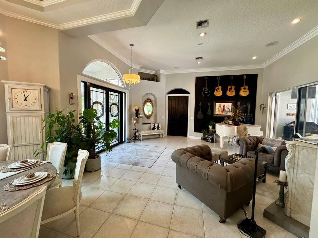 Photo of 14636 Stirrup Lane, Wellington, FL 33414 (MLS # B26073004)