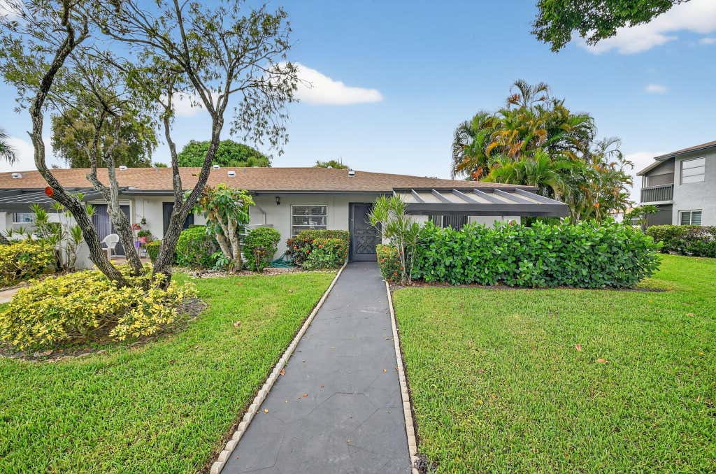 Photo of 5831 Sugar Palm Court #D, Delray Beach, FL 33484 (MLS # R11119504)