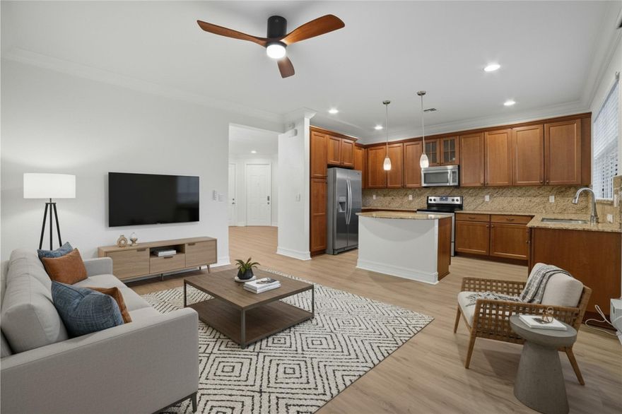 Elegant 3BR/2.5BA end-unit townhome in a gated Plantation community offering nearly 2,000 sq. ft. of refined living. A chef’s kitchen with granite counters, stainless appliances, pendant lighting, and custom cabinetry opens to spacious living areas with 9’ ceilings and abundant natural light. The owner’s suite features a Roman tub, glass shower, dual vanities, and a walk-in closet. Impact windows, epoxy-finished garage, covered patio, new A/C and upstairs laundry add convenience. Resort-style amenities include a pool, sundeck, and clubhouse, all surrounded by landscaped green spaces and walking paths. Ideally located near premier dining, shopping, and city parks with quick access to I-595, I-75, Sawgrass, and the Turnpike, offering the perfect blend of elegance and everyday ease.