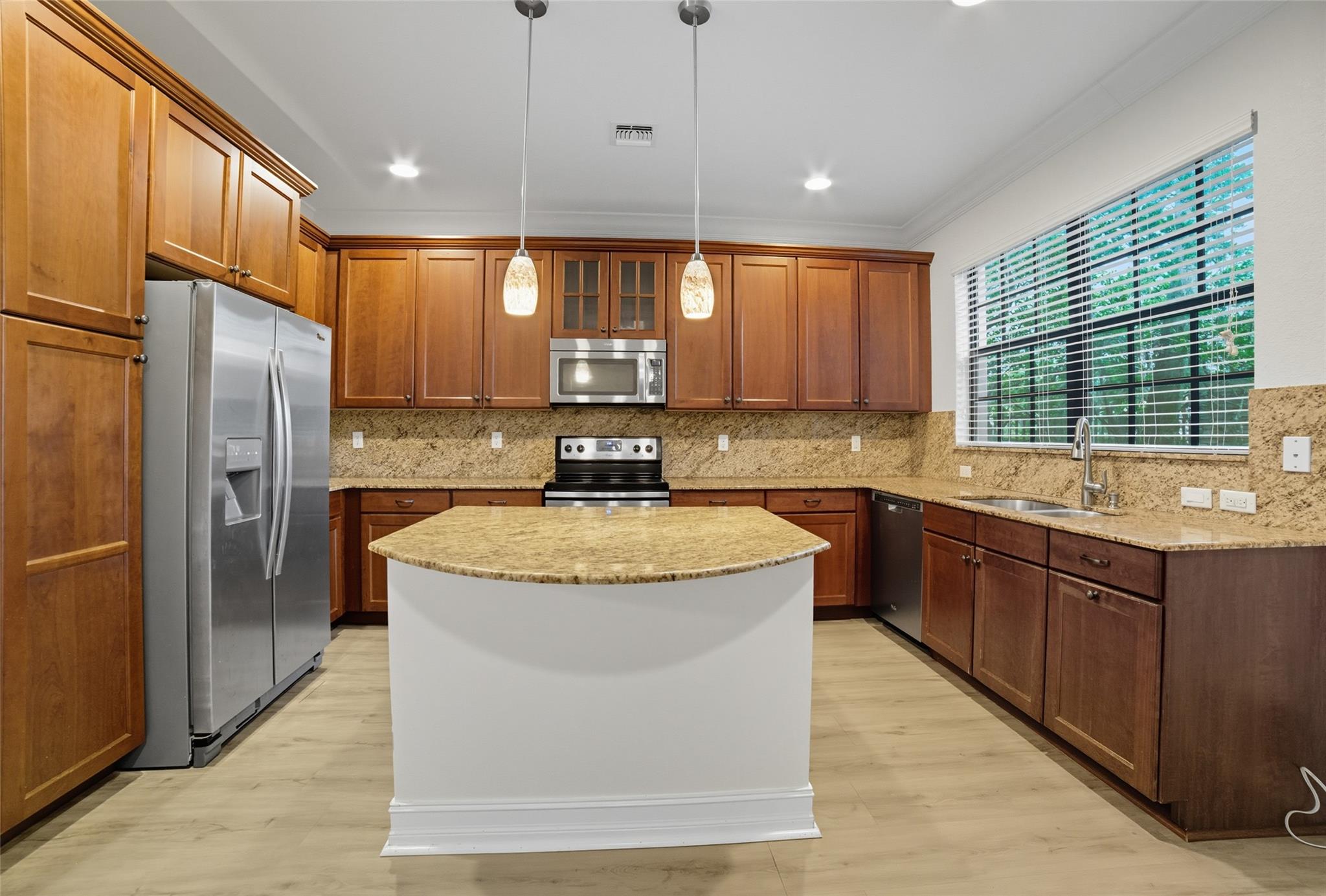 Elegant 3BR/2.5BA end-unit townhome in a gated Plantation community offering nearly 2,000 sq. ft. of refined living. A chef’s kitchen with granite counters, stainless appliances, pendant lighting, and custom cabinetry opens to spacious living areas with 9’ ceilings and abundant natural light. The owner’s suite features a Roman tub, glass shower, dual vanities, and a walk-in closet. Impact windows, epoxy-finished garage, covered patio, new A/C and upstairs laundry add convenience. Resort-style amenities include a pool, sundeck, and clubhouse, all surrounded by landscaped green spaces and walking paths. Ideally located near premier dining, shopping, and city parks with quick access to I-595, I-75, Sawgrass, and the Turnpike, offering the perfect blend of elegance and everyday ease.