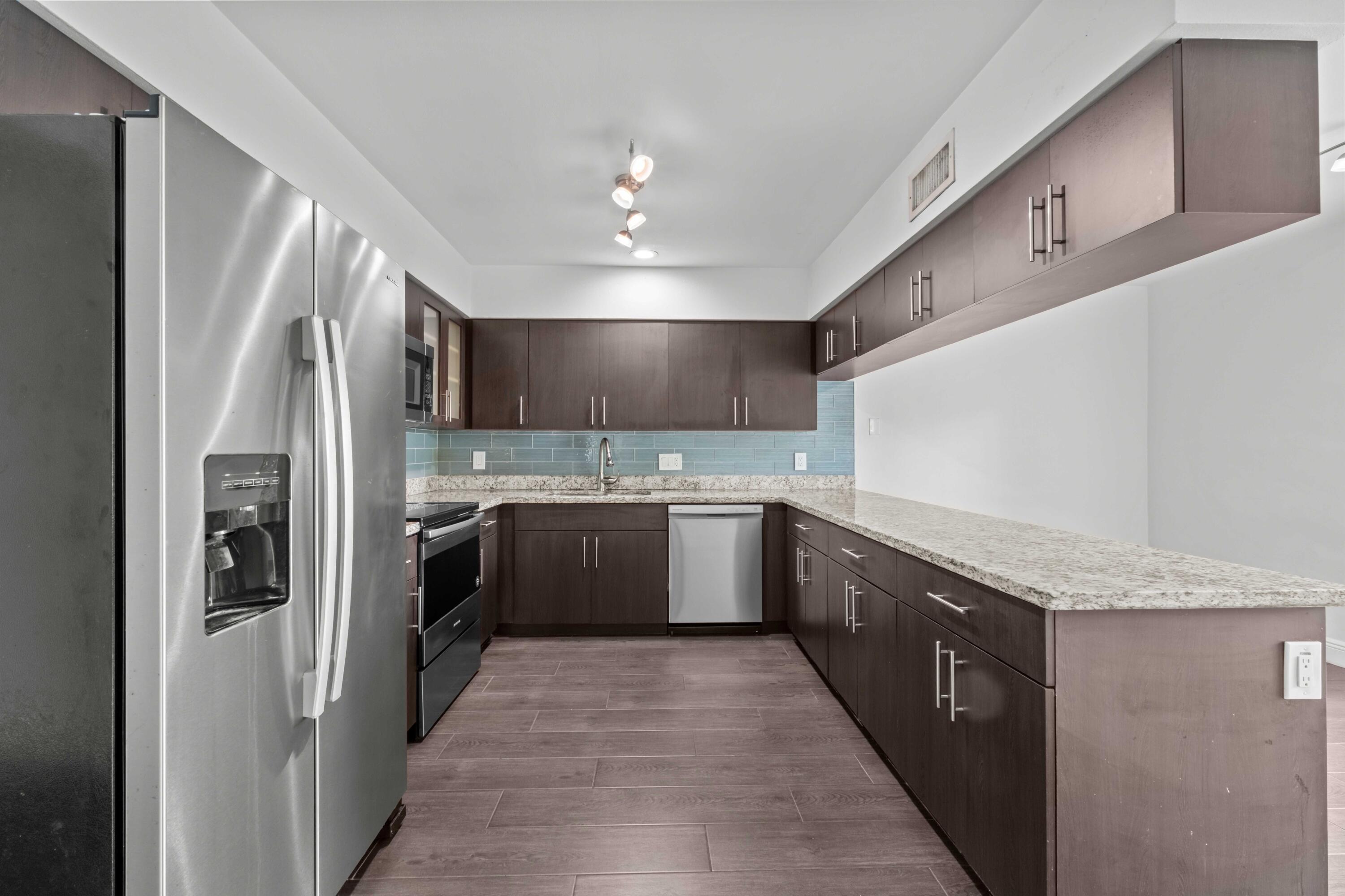 Spacious and renovated 3 bed / 2 bath Duplex in North Fort Lauderdale! Live less then 2.5 miles from the beach in this beautifully updated unit. Features include hurricane-rated impact doors and windows, updated appliances, central A/C, in-unit washer & dryer, and two dedicated parking spaces. Enjoy a bright open layout, stylish finishes, and a prime location close to shopping, dining, and more.