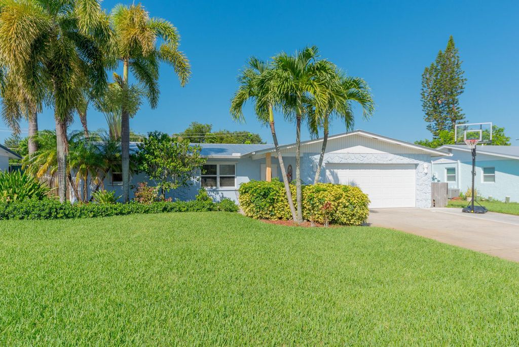 Photo of 1484 NE 24th Street, Jensen Beach, FL 34957 (MLS # R10962684)