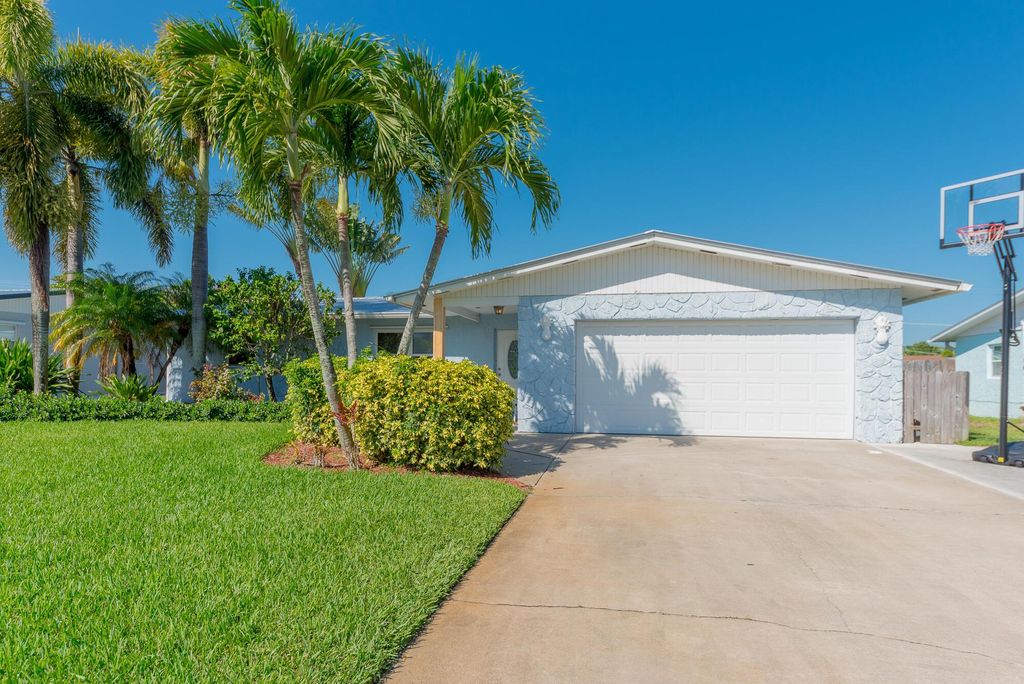 Photo of 1484 NE 24th Street, Jensen Beach, FL 34957 (MLS # R10962684)