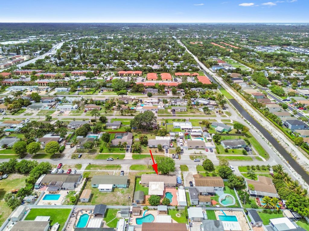 Photo of 1560 Roy Drive, West Palm Beach, FL 33415 (MLS # B26012651)