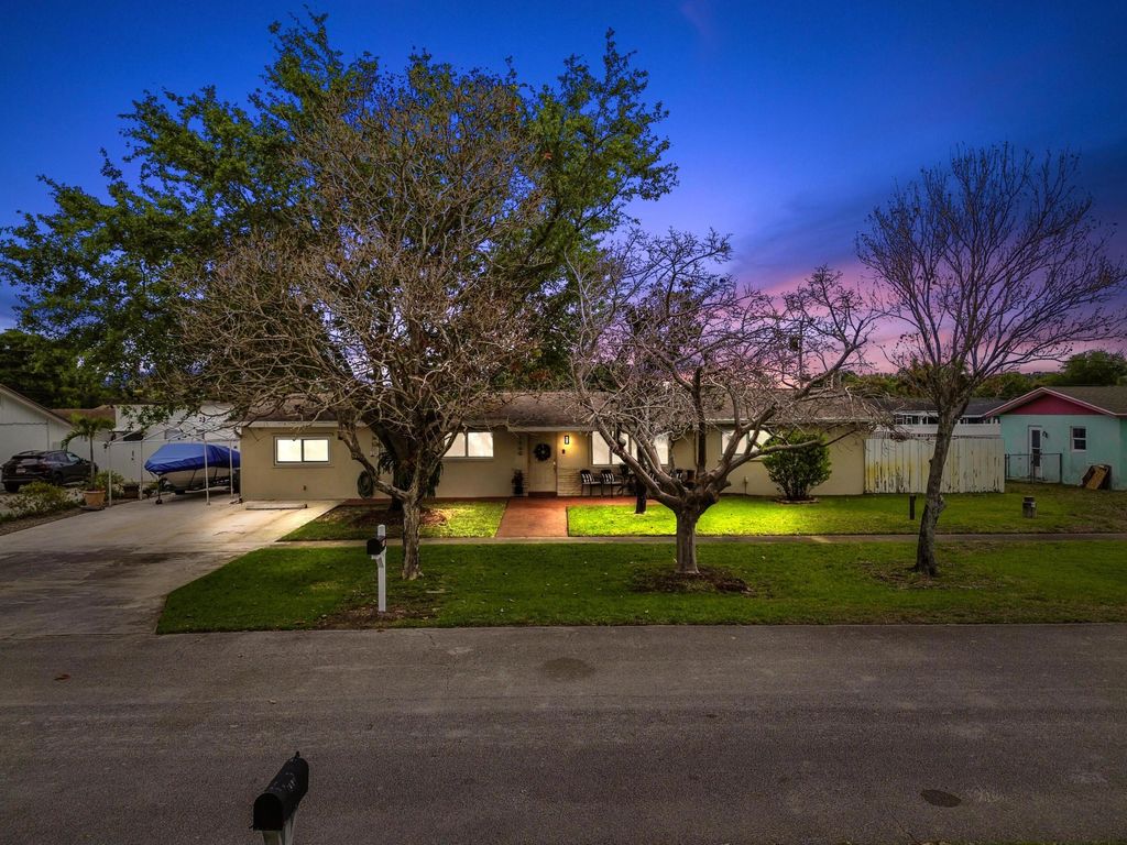 Photo of 1560 Roy Drive, West Palm Beach, FL 33415 (MLS # B26012651)