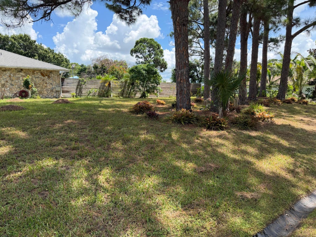 Photo of 1325 SE Laconia Lane, Port Saint Lucie, FL 34983 (MLS # B26073252)