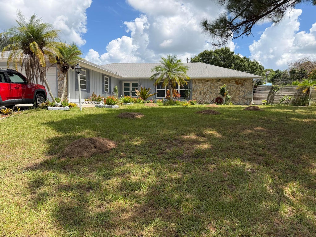 Photo of 1325 SE Laconia Lane, Port Saint Lucie, FL 34983 (MLS # B26073252)