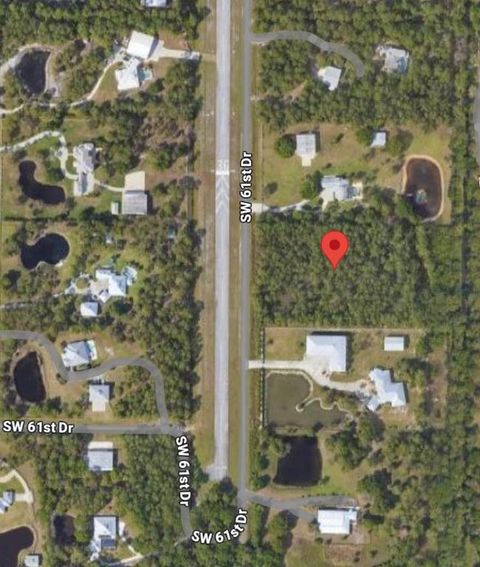 Photo of 5685 SW 61st Drive, Palm City, FL 34990 (MLS # R11034642)