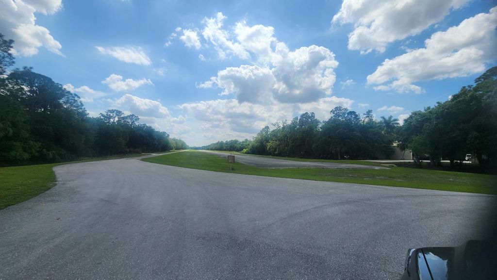 Photo of 5685 SW 61st Drive, Palm City, FL 34990 (MLS # R11034642)