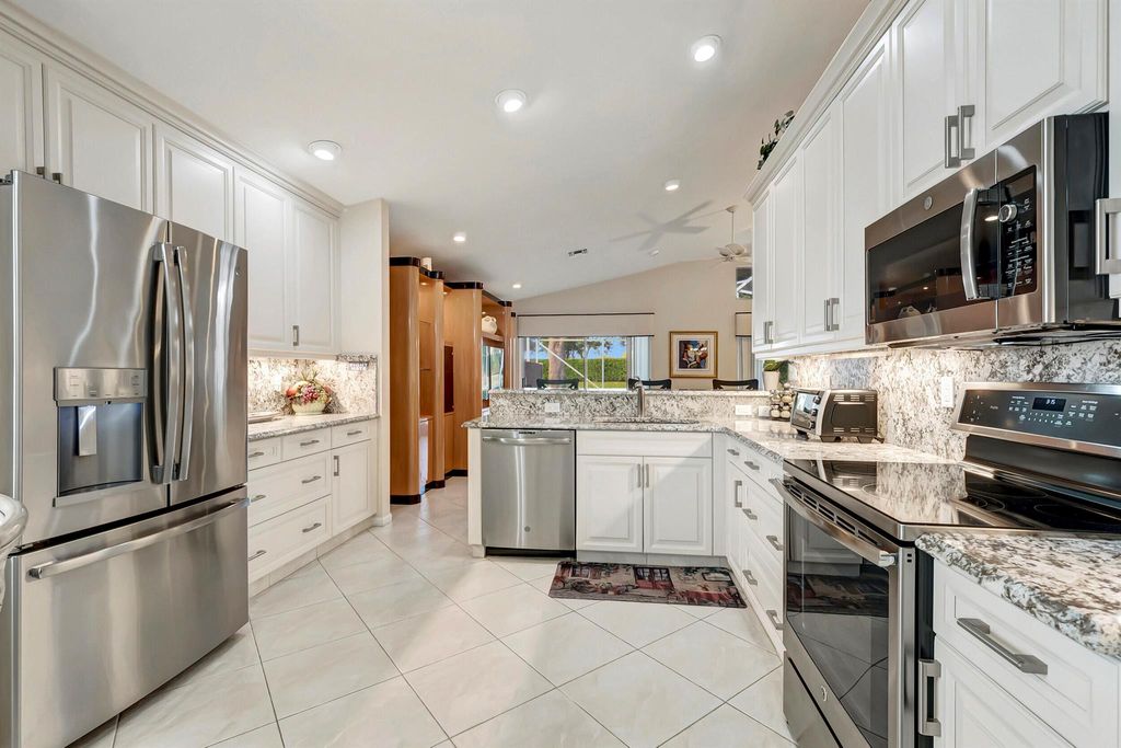 Photo of 6933 Castlemaine Avenue, Boynton Beach, FL 33437 (MLS # R10940056)