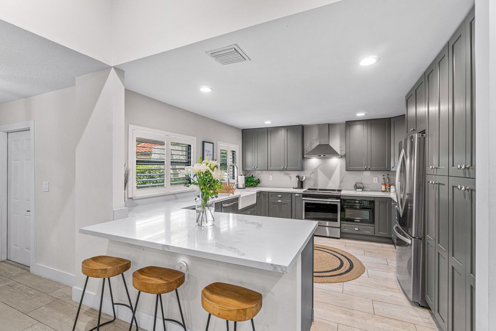 Photo of 2155 NW 14th Street, Delray Beach, FL 33445 (MLS # R11032646)