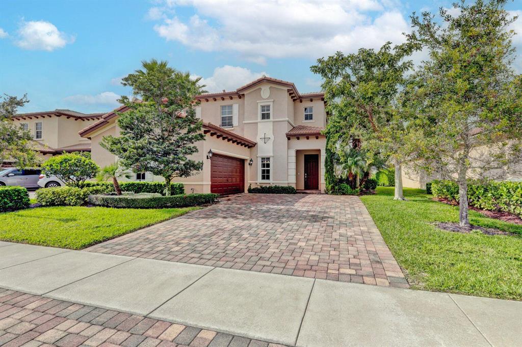 Absolutely Amazing 4 Bedroom, 2.1 Bathroom, 2 Car Garage House In The Sought After Gated Community of Rialto. Step Inside This Naturally Bright Home Offering High Ceilings, Tile Floors Throughout Main Living Areas, Spacious Kitchen Exuding 42' Wood Cabinetry, Granite Countertops, SS Appliances. All 4 Bedrooms & Laundry Room Are Conveniently Found Upstairs. The Master Bedroom Includes A Large Walk In Closet & Beautiful Ensuite Master Bathroom Including A Tub & Separate Shower.The Backyard Lanai is Perfect to Entertain Family Or Friends & The Large Yard is The Perfect Space! Rialto includes: A Gatehouse, Playgrounds, Splash Park, Resort Style Pool, Fitness Center & Is Zoned to A Rated Schools. Only Minutes to I-95, Florida Turnpike & Gardens Mall.