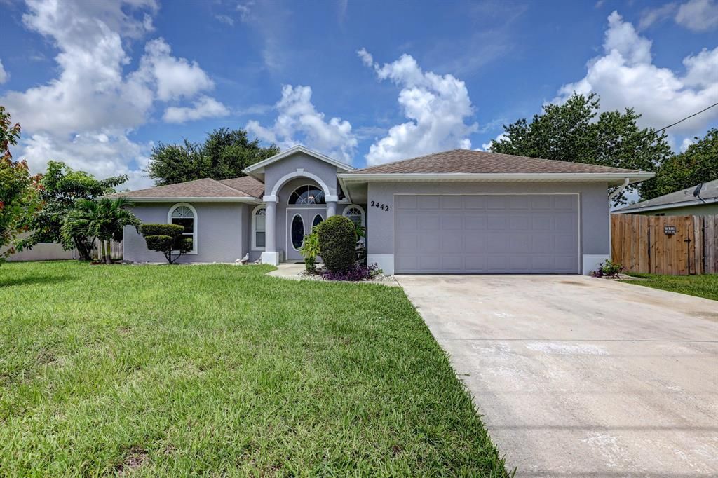 Photo of 2442 SW Dalpina Road, Port Saint Lucie, FL 34953 (MLS # R10730584)