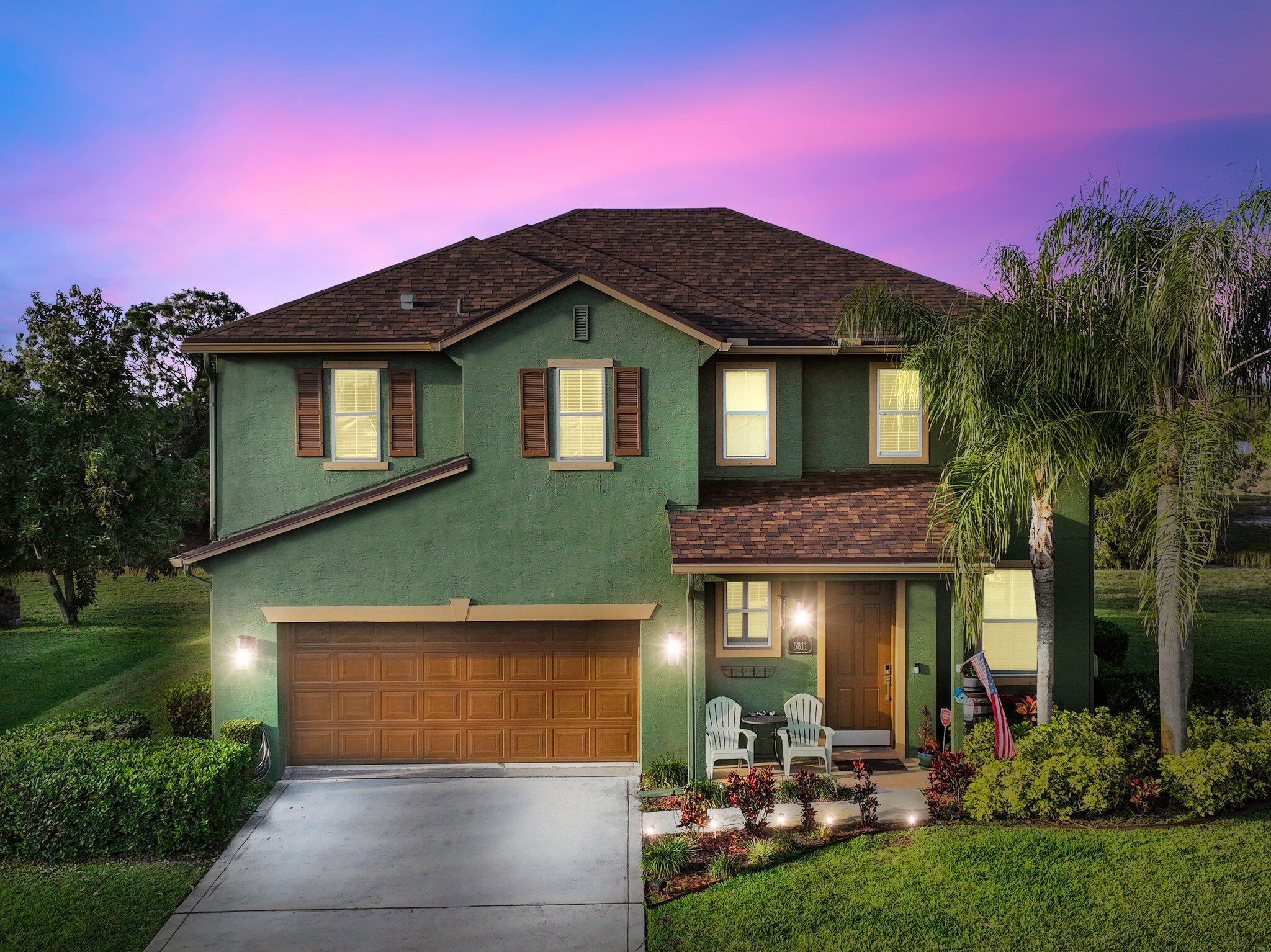 Welcome to 5811 Fall Flower Ct, a 3-bed, 2-bath, 2,204 sqft CBS home built in 2006, situated at the end of a quiet cul-de-sac. Step inside to discover a tasteful blend of tile & wood-like laminate flooring, complemented by a spacious kitchen boasting 42'' cabinets, granite countertops, & stainless steel appliances. The expansive master suite features a generously-sized bath with a Roman tub, separate shower, & a closet the size of a bedroom. The well-maintained exterior offers a serene run-off view, 2023 Roof/ Exterior Paint, 2024 AC, a 2017 well irrigation system, & hurricane shutters for added security. Conveniently located near METS Stadium, St. Lucie West shopping, & I-95. This home is competitively priced to sell, & won't last long!