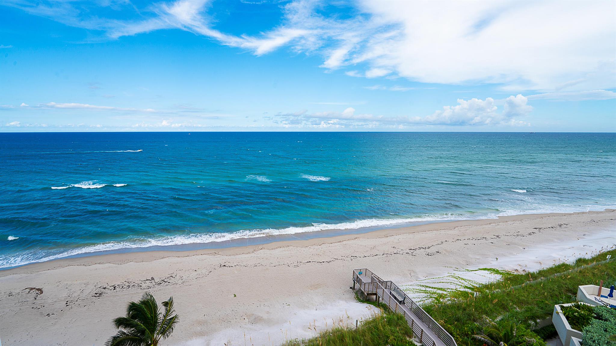 DIRECT OCEANFRONT CONDO with unobstructed panoramic views surrounded by gorgeous blue & turquoise water overlooking the ocean to the east and southern views including the intracoastal. This light and bright corner residence has incredible water views from every room with floor to ceiling impact glass windows and slider doors, tile floors throughout, master-bath dual vanities, Roman tub and walk-in shower... Relax watching the boats cruise by while enjoying dining & drinks on your balcony surrounded by wide open views everywhere! This property boasts some of the best views on Singer Island! Water Glades residents have access to many amenities including private beach frontage, two large pools, BBQ area, gorgeous clubhouse on ocean for parties, tennis and covered parking.