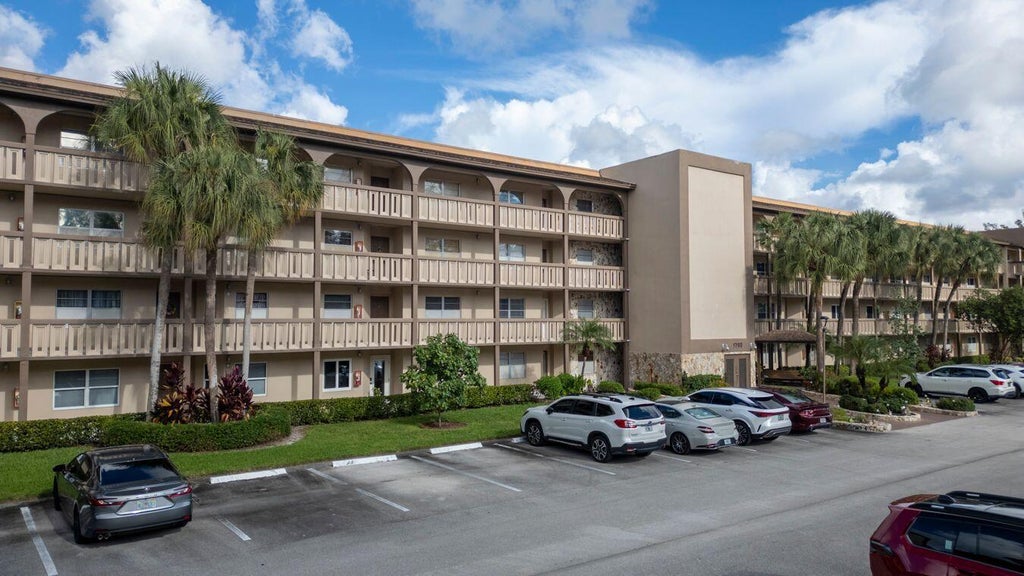 Photo of 1703 Andros Isle #J1, Coconut Creek, FL 33066 (MLS # B26090364)