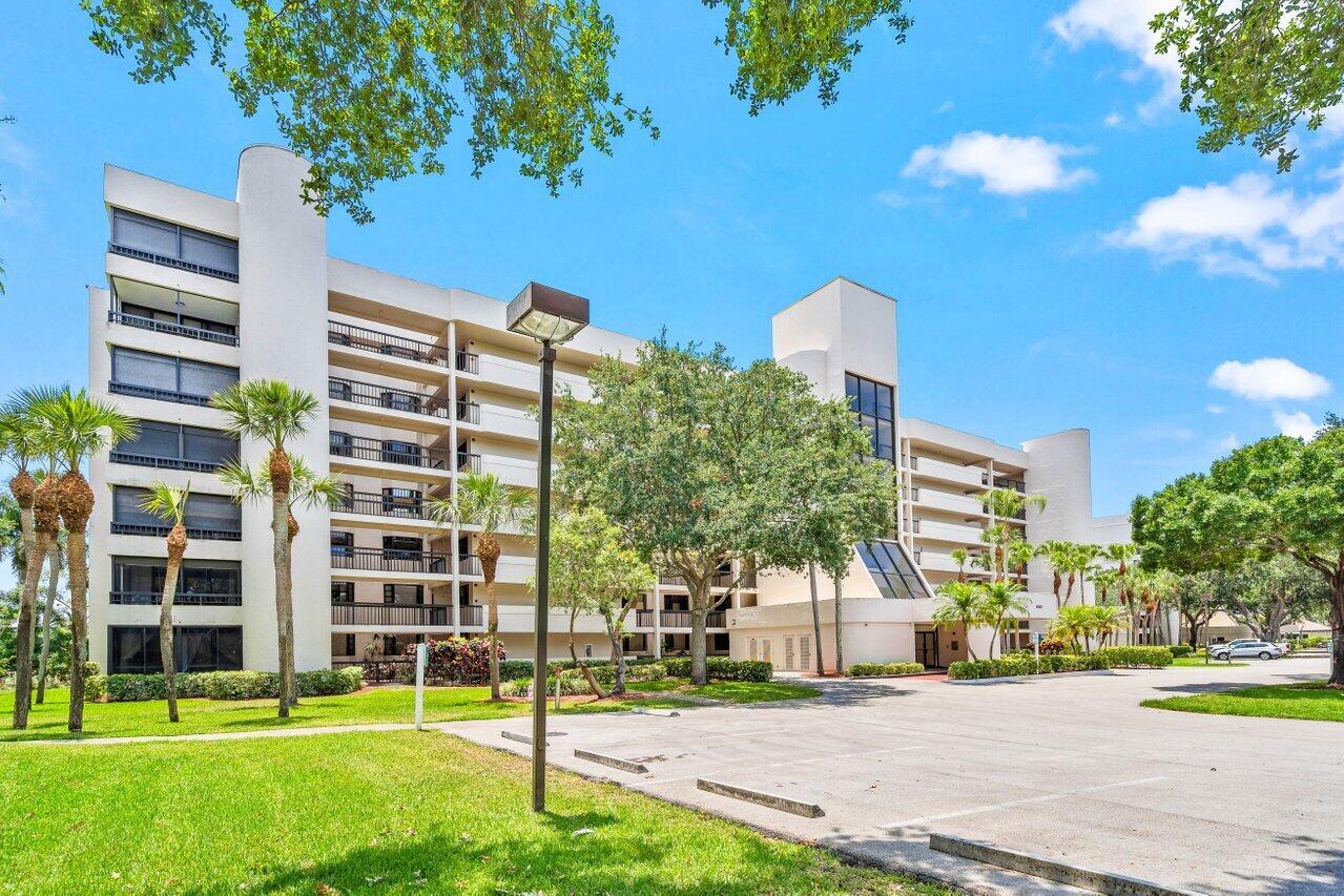 Best deal in The Glens. Beautiful two bedroom condo at the Glens with outstanding views of the Via Mizner Golf Course! Neutral tile flooring run throughout on the diagonal. This condo has been extremely well cared for and is ready for its next owner. Spacious primary suite with access on to the balcony. The Glens is a 55+ standout Central Boca community located near the Town Center mall, the new Restaurant Row, and so much more. The clubhouse features a billiards room, heated pool and spa, & gas grills. Brand new roofs recently installed on all three buildings. Assessment will be paid by seller at closing.