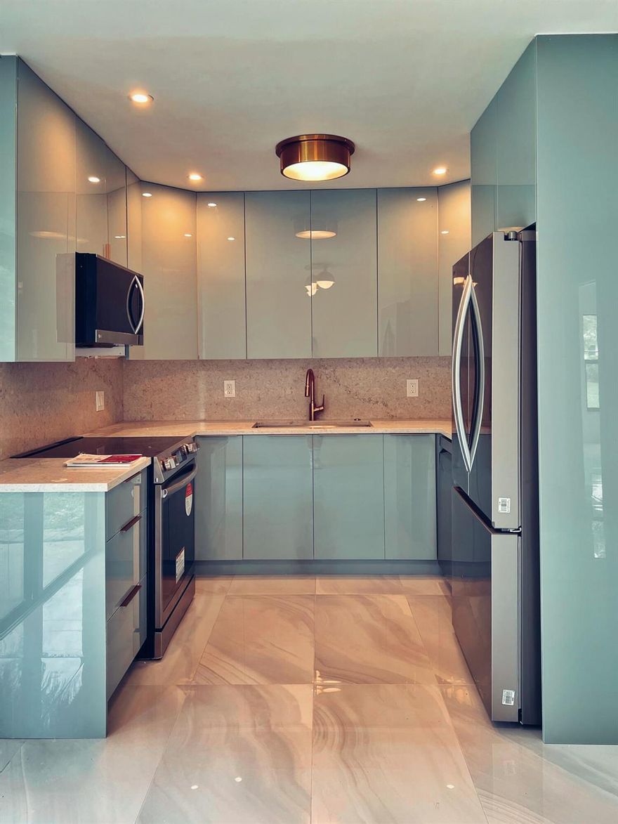 Welcome to this beautifully remodeled duplex in the heart of West Palm Beach! This charming 2-bedroom, 1-bath home offers modern upgrades and a prime location just minutes from I-95, Northlake Blvd, and close to Palm Beach Outlets and more.Energy-Efficient Upgrades: New hurricane-proof windows and doors, tankless water heater, and central AC.Convenience: Separate laundry room with new washer and dryer.Outdoor Living: Spacious fenced backyard with a patio--perfect for entertaining or relaxing.Parking: Two dedicated spots.Community Perks: Landscaping includes This home combines comfort, style, and convenience in one perfect package.