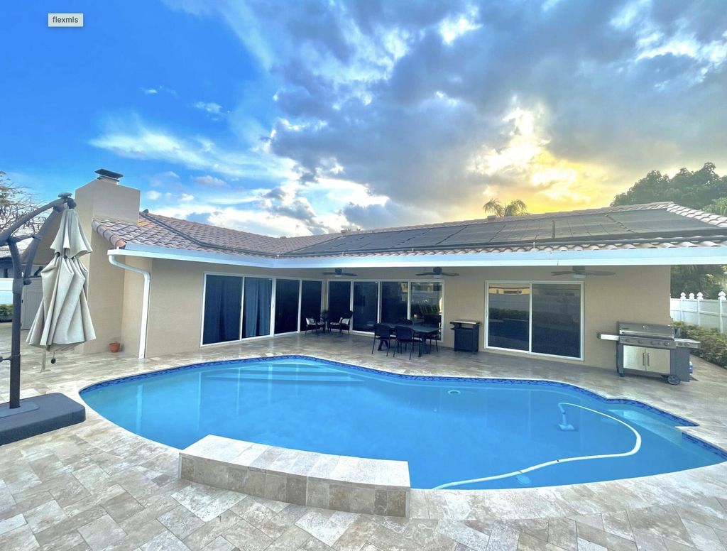 Photo of 6992 W Calle Del Paz W, Boca Raton, FL 33433 (MLS # B26000408)