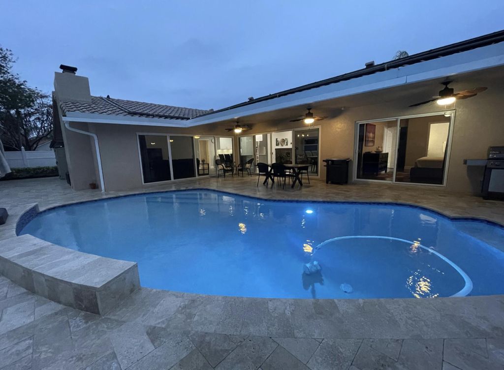 Photo of 6992 W Calle Del Paz W, Boca Raton, FL 33433 (MLS # B26000408)