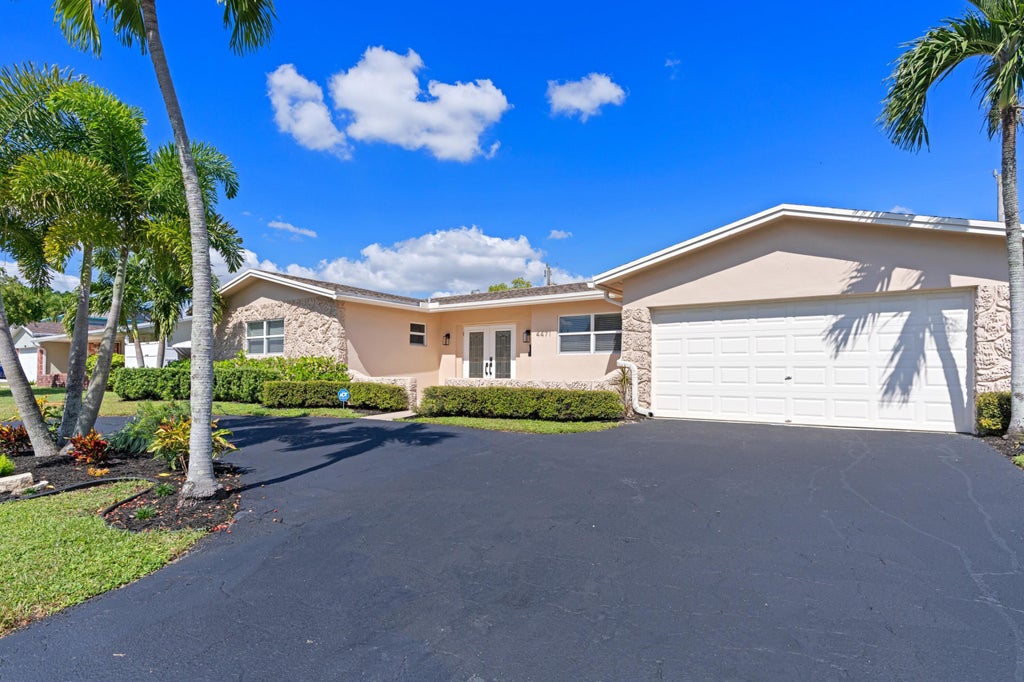 Photo of 4471 NW 6TH Court, Coconut Creek, FL 33066 (MLS # B26079302)