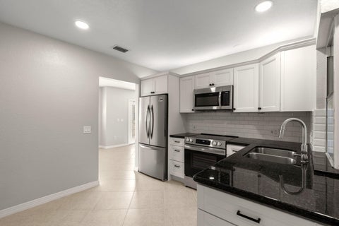 Tiny photo for 4471 NW 6th Court, Coconut Creek, FL 33066 (MLS # B26079302)