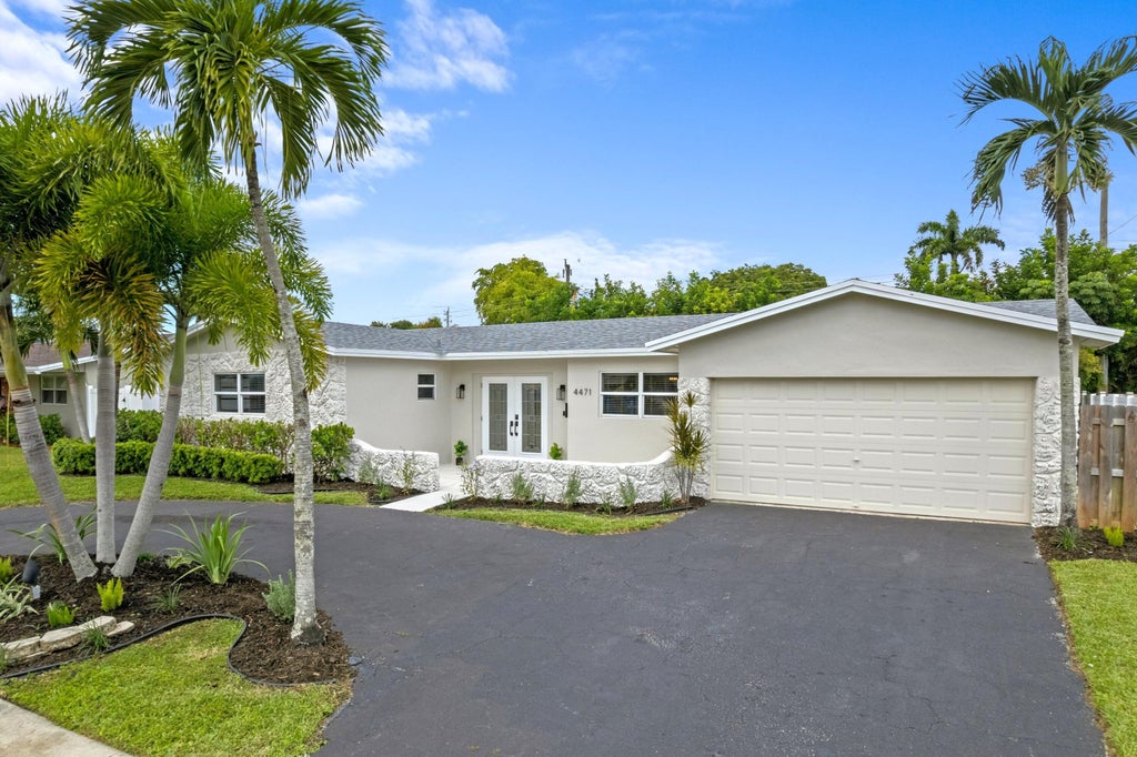Photo of 4471 NW 6th Court, Coconut Creek, FL 33066 (MLS # B26079302)