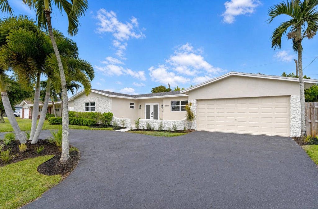 Photo of 4471 NW 6th Court, Coconut Creek, FL 33066 (MLS # B26079302)