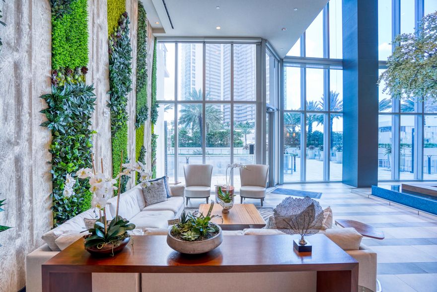 ELEVATE YOUR LIFE at one of Miami's most recognized residential destinations: Paramount Miami Worldcenter. This three-bedroom plus den residence features a reimagined open layout, modern design elements, and floor-to-ceiling glass showcasing expansive city and bay views from every room. A private balcony extends the living space and highlights the skyline's architectural landscape. Residence 812 includes generous living and dining areas, a well-appointed kitchen with Miele and Sub-Zero appliances, quartz surfaces, designer tile work, and custom cabinetry. All bathrooms feature elevated finishes, upgraded fixtures, and thoughtful detailing throughout. Located within the Miami Worldcenter district, this address provides access to a broad range of retail, dining, entertainment, and cultural destinations throughout downtown Miami. Its central position offers connection to many of Miami's most notable attractions, including the Design District and the beaches. Paramount Miami Worldcenter is known for its extensive amenity collection, including multiple resort-style pools, a Sky Deck with 360-degree views, basketball court, spa, fitness center, lounges, and a contemporary lobby experience. As part of one of the largest private master-planned developments in the United States, residents enjoy a comprehensive range of on-site offerings.  851 NE 1st Avenue #812 represents a rare opportunity to own a residence defined by elevated design, expansive views, and proximity to one of Miami's most dynamic urban districts.