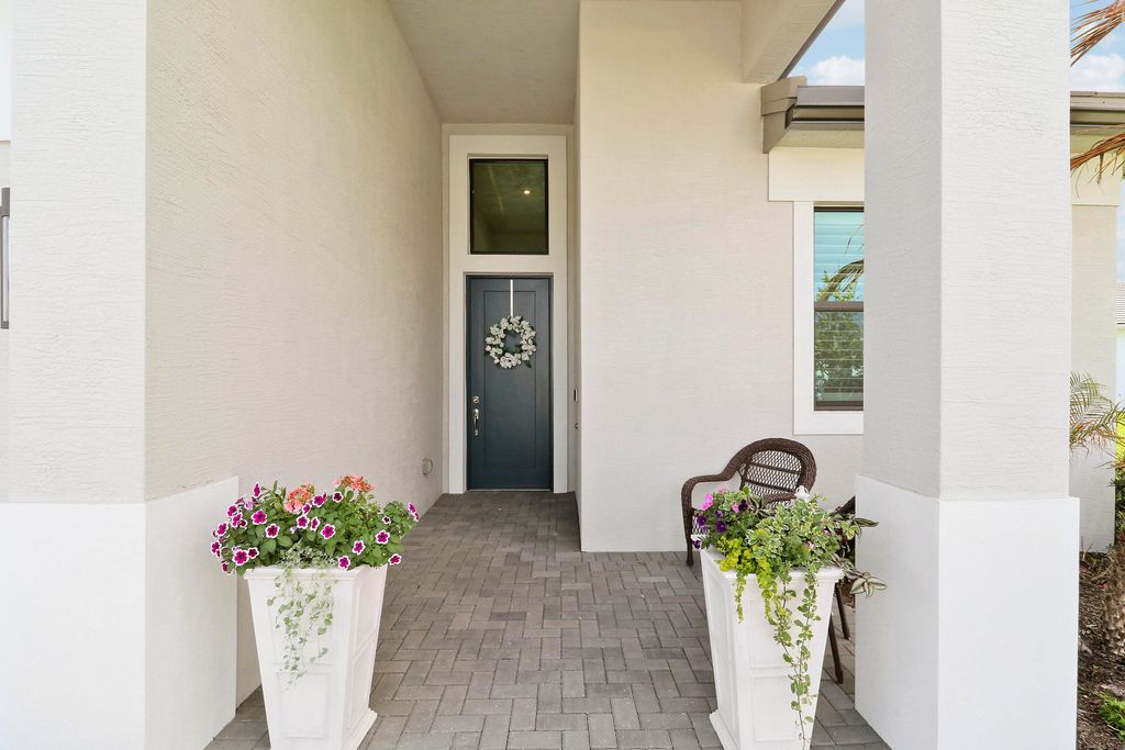 Photo of 7030 SE Haven Lane, Stuart, FL 34997 (MLS # B26006778)