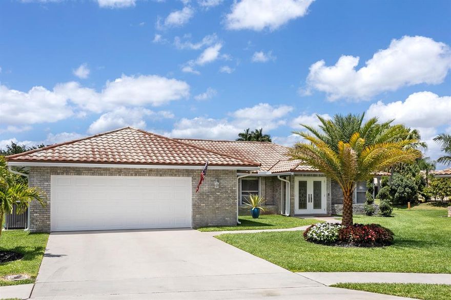 Beautiful home in a gated golf community in west Boca. You can play the golf course with no membership or yearly dues.  Just pay and play.  This well maintained home just painted both the interior/exterior, new A/C & handler, new upgraded electric, new fans, new refridgerator, new screened pool enclosure, new painted/sealed pool patio, new pool motor w/an auto pool cleaner, new irragation system, new landscaping & much more.  Fiber optic cable & internet are included in the low HOA fees.