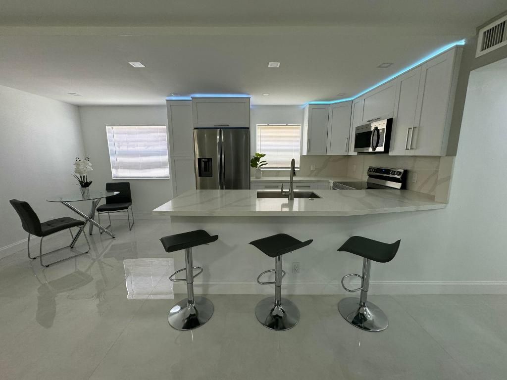 Photo of 440 Saxony J, Delray Beach, FL 33446 (MLS # R11074918)