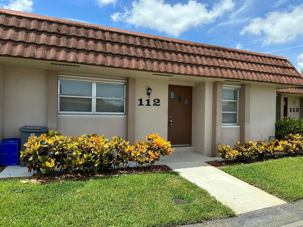 Photo of 5775 Fernley Drive W #112, West Palm Beach, FL 33415 (MLS # R11150437)