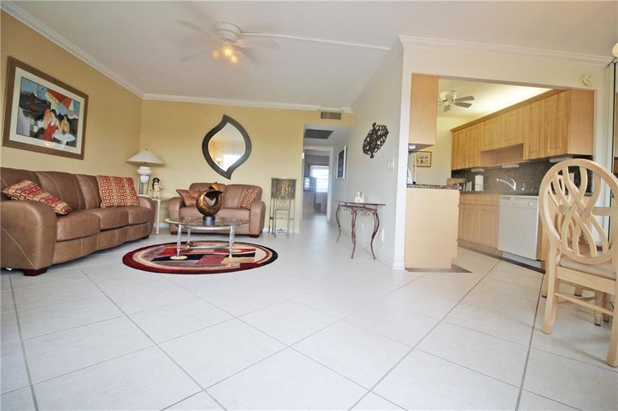 WATERVIEW, 4TH FLOOR & FULLY FURNISHED!! YOU WILL LOVE THIS 2 BEDROOM, 1.5 BATH WITH UPDATED KITCHEN & BATHS!! CERAMIC TILE & CROWN MOLDING IN LIVING & DINING AREAS! THE KITCHEN FEATURES DOUBLE SINK, GRANITE COUNTERTOPS & BACKSPLASH! A/C & HWH JUST 1.5 YEARS OLD! THE ENSUITE BATHROOM HAS A LOVELY WALK IN SHOWER WITH TILED WALLS & GLASS SHOWER DOOR! NO POPCORN CEILINGS HERE!! ENJOY THE 4TH FLOOR VIEW OVERLOOKING THE WATER FROM THE ENCLOSED PATIO W/ TILE FLOORS! THIS IS A NON RENTAL BUILDING WITH A 650 MINIMUM CREDIT SCORE! CENTURY VILLAGE EAST IS A GUARD GATED COMMUNITY W/ A FABULOUS CLUBHOUSE OFFERING A STATE OF THE ART GYM, 1,500 SEAT THEATER AND CLUBS GALORE!! SITUATED LESS THAN 4 MILES FROM SOUTH FLORIDA'S MOST BEAUTIFUL BEACHES! YOU'LL LOVE THIS PLACE! ASSOCIATION CLAIMS 55+