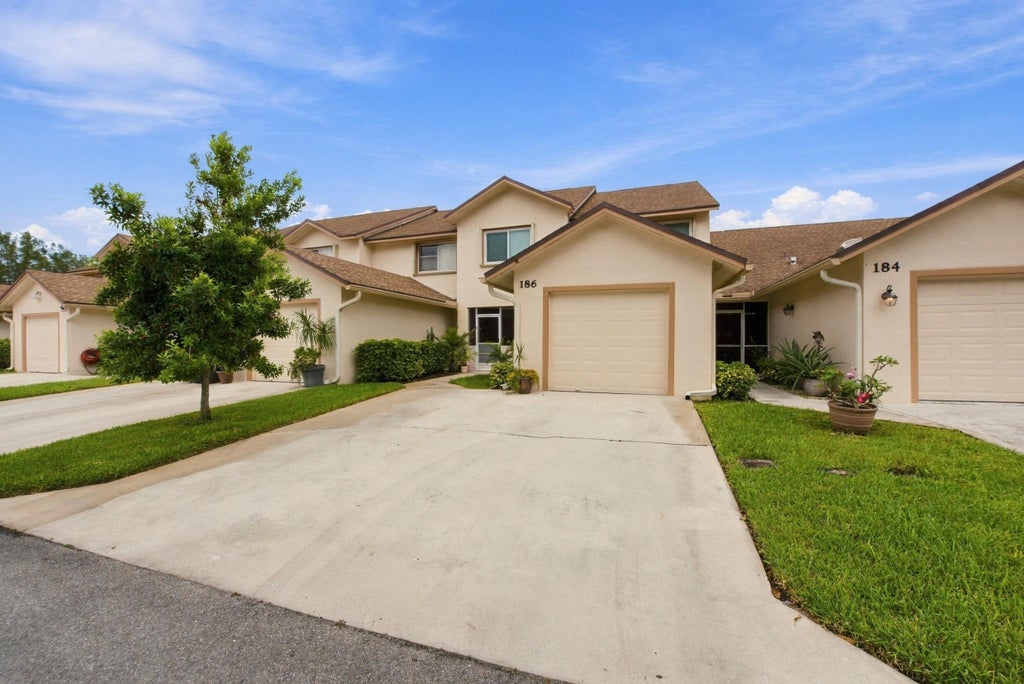 Photo of 186 PAR Drive #186, Royal Palm Beach, FL 33411 (MLS # B26092727)