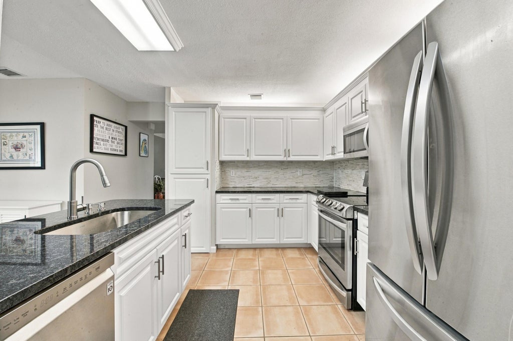 Photo of 186 PAR Drive #186, Royal Palm Beach, FL 33411 (MLS # B26092727)