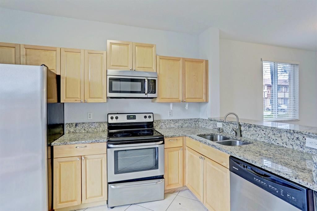 Photo of 3540 Oleander Terrace, Riviera Beach, FL 33404 (MLS # R10694527)