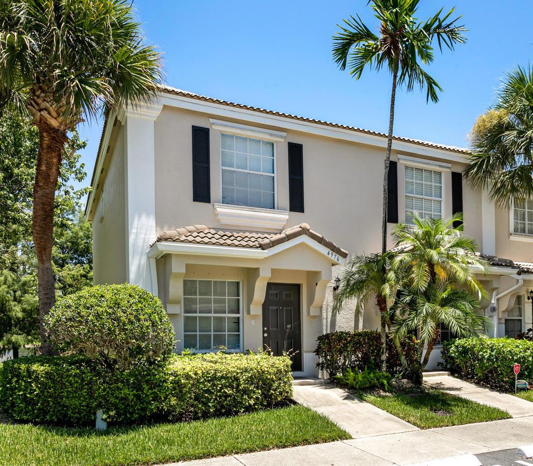 A charming townhouse nestled within a secure, gated community. This home offers serene pond views and a peaceful, private setting - perfect for relaxing after a busy day. Residents enjoy access to scenic jogging and biking trails. Conveniently located just minutes from shopping, dining, and entertainment options, including local markets, restaurants, and cafes. Families will appreciate Inside, the home combines comfort and functionality, offering a cozy yet spacious layout designed for modern living. With a thoughtful balance of charm and convenience, 4976 Palmbrooke Circle is an ideal choice for anyone looking to enjoy the best of West Palm Beach living.Available now for a 6-month lease during season. not available from June through July 2026.