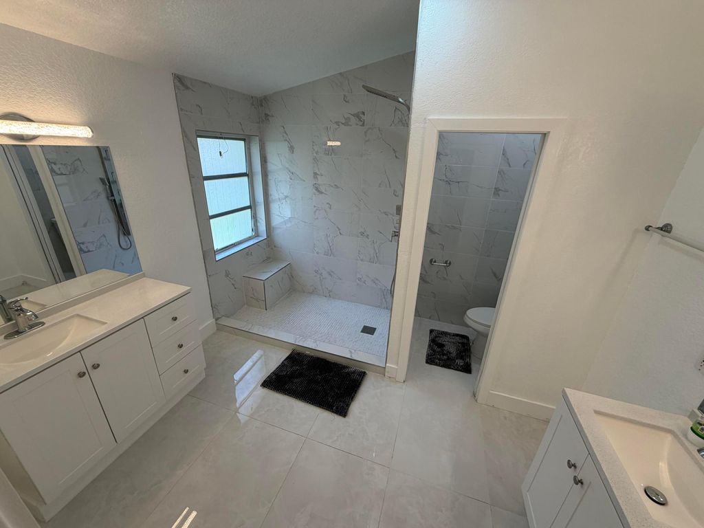 Photo of 9706 Harbour Lake Circle, Boynton Beach, FL 33437 (MLS # B26017401)