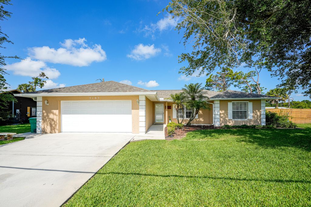 Photo of 5105 Paleo Pines Circle, Fort Pierce, FL 34951 (MLS # B26023002)