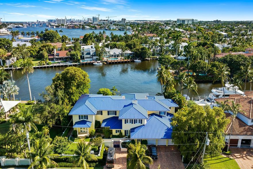 Fabulous home in Rio Vista Isles - Come live on coveted 7th Street  - This home sits on an almost 17000 sq ft lot with 135' of prime waterfrontage and a 300' turning basin for ease in docking your yacht- The wide basin makes you feel like you are on your own private island - The property is the second home from the intercoastal waterway making it an easy in and out with only minutes to the ocean.The home features 6 ensuite bedrooms, full gym with sauna, and a movie room!